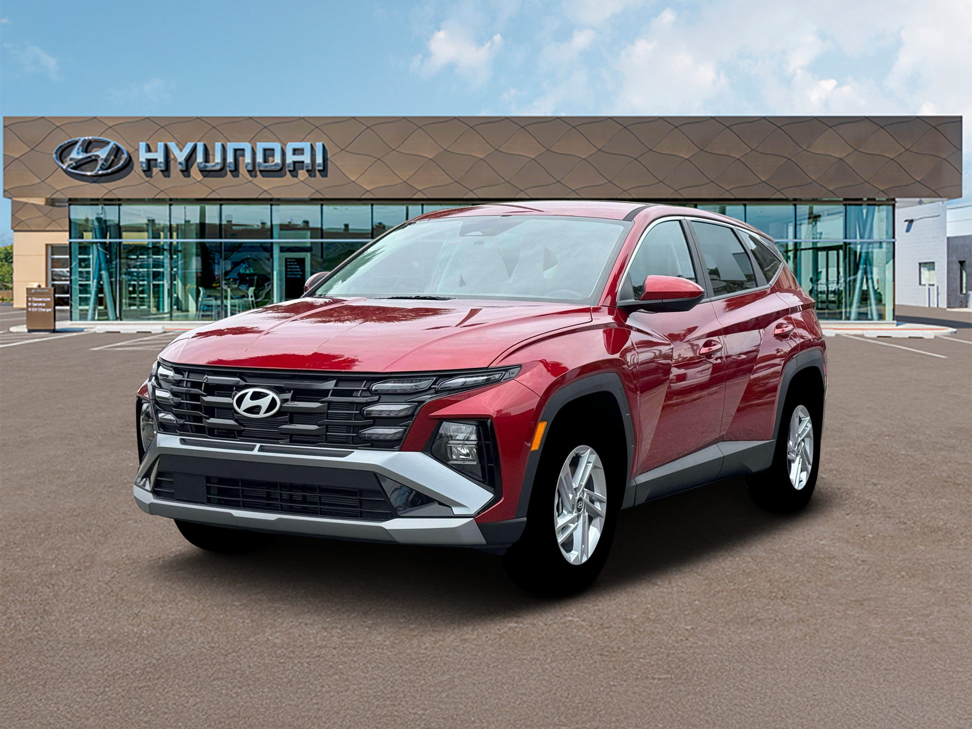 2026 Hyundai TUCSON SE AWD in Ultimate Red — front three-quarter view