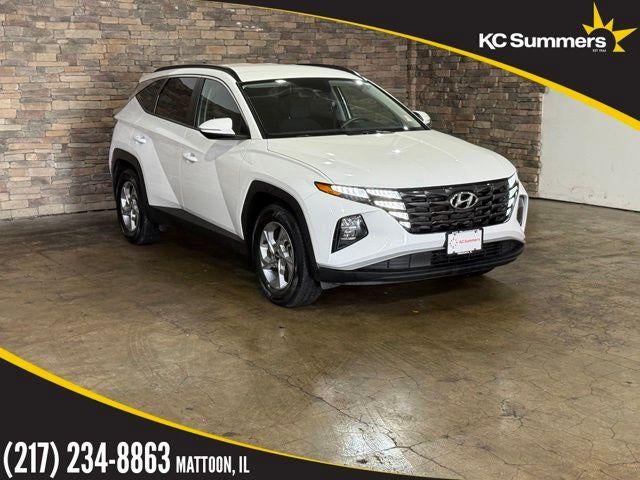 2023 Hyundai TUCSON SEL FWD in Serenity White Pearl — front three-quarter view
